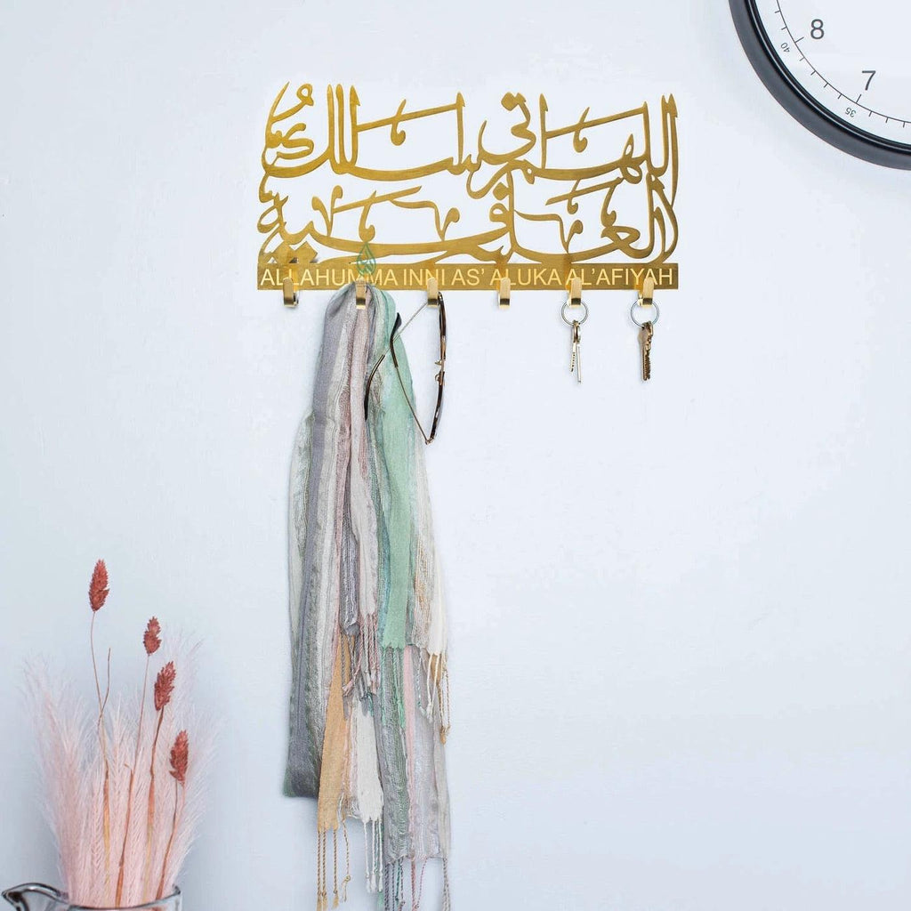 Stainless steel key holder with both Arabic and English transliteration of a powerful dua, comes in gold, rose gold, and silver with a gift box.