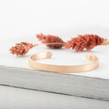 Minimalist plain cuff bracelet for women, adjustable size, triple gold-plated, elegant and versatile design for daily wear.